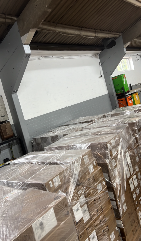Palletised stock wrapped for shipping in our current facility